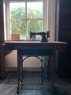 antieke Köhler naaimachine, Ophalen