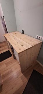 Ombouw voor wasmachine en droger, Ophalen