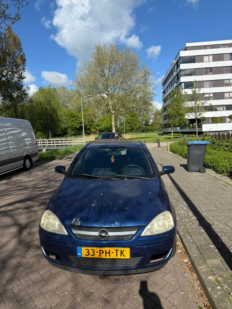 Opel Corsa 1.2 16V 3D 2004 Blauw, Voorwielaandrijving, 450 kg, 74 pk, 31 €/maand