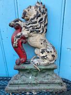 Gietijzeren leeuw beeldje, Ophalen