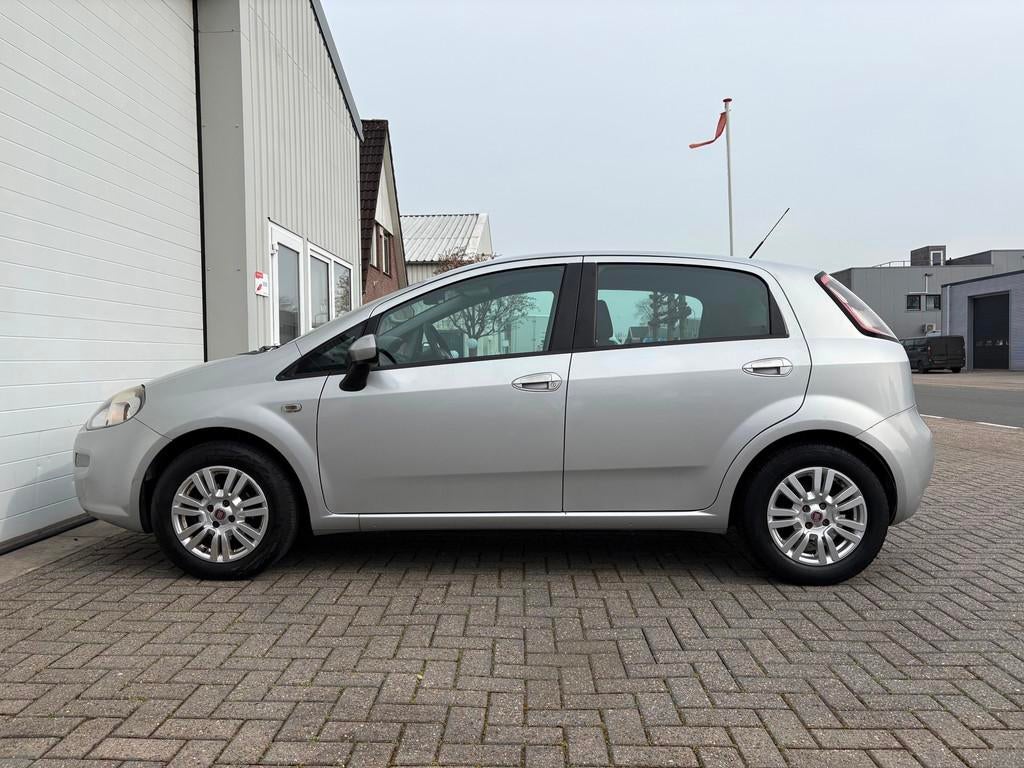 Fiat Punto Evo 1.2 Pop 1e EIGENAAR|TREKHAAK|AIRCO|RIJKLAAR, Auto's, Voorwielaandrijving, 1242 cc, 4 cilinders, 400 kg