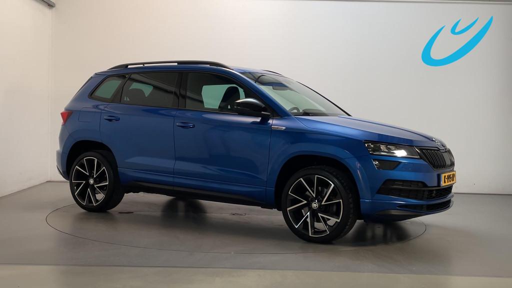 Skoda Karoq 1.5 TSI 150pk DSG ACT Sportline Business Panoram, Stof, 4 cilinders, Blauw, Bedrijf