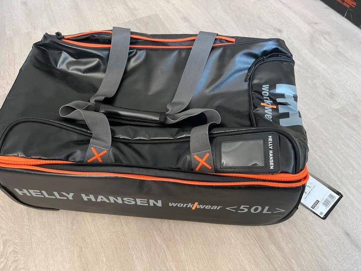 Nieuwe Helly Hansen 50L rolkoffer - Droog en nat gescheiden, Sieraden, Tassen en Uiterlijk, Tassen | Reistassen en Weekendtassen
