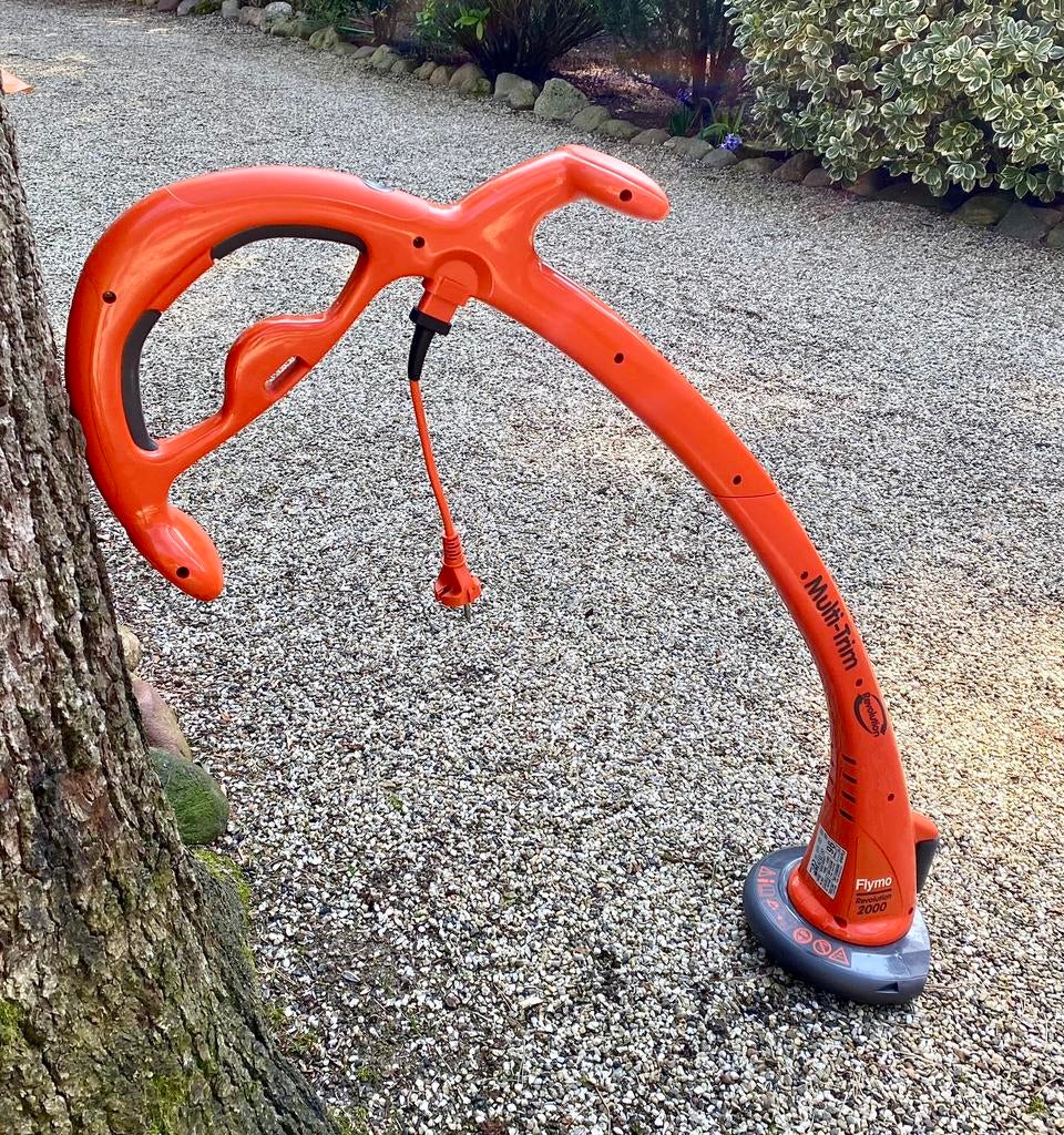 Flymo revolution 2000 multi trim z.g.a.n., Tuin en Terras, Grastrimmers, Ophalen of Verzenden, Zo goed als nieuw, Elektrisch