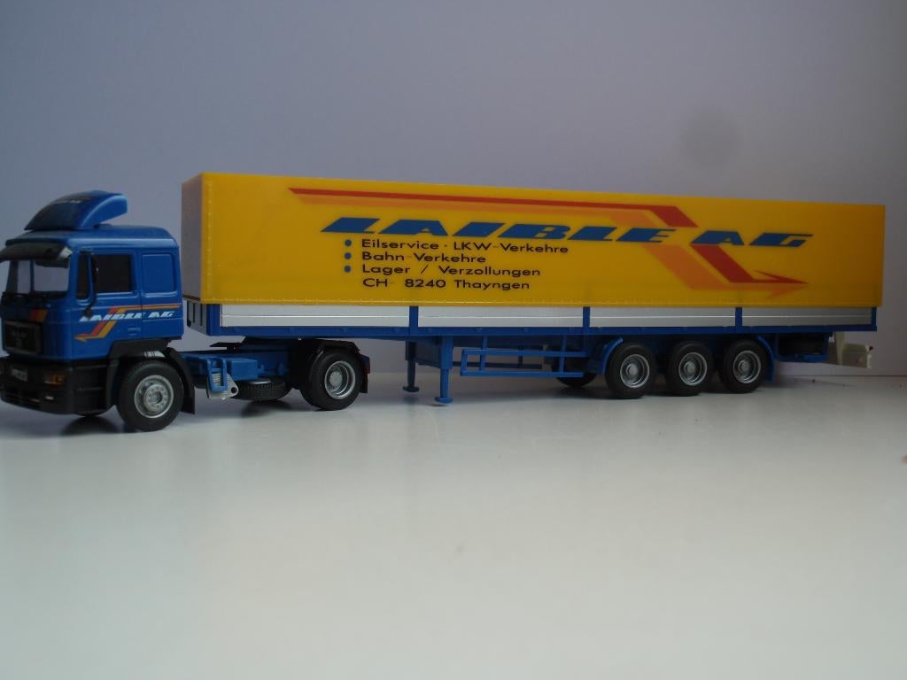 AWM MAN F90 met huiftrailer LAIBLE (CH), Hobby en Vrije tijd, Modelauto's | 1:87, Ophalen of Verzenden, Zo goed als nieuw, Bus of Vrachtwagen