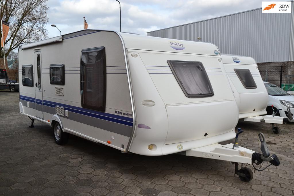 Hobby 560 Excellent - Nieuw model - Airco - Queenbed - TV -, Caravans en Kamperen, Caravans, Vast bed, Bedrijf, Info@selectcars.nl