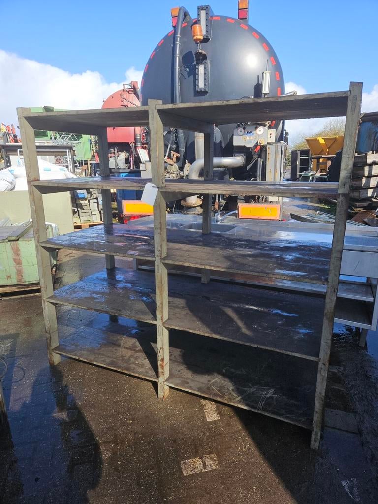 Degelijke houten werkplaatsstelling, Ophalen