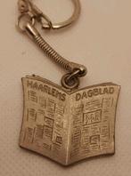 Oude vintage metalen sleutelhanger Haarlems Dagblad, Ophalen of Verzenden, Zo goed als nieuw