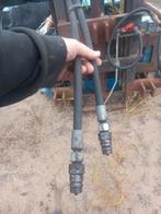 Nette achterlader en stevige heftmast met balenklem, Ophalen