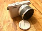 Nikon 1J3 systeemcamera met 10-30 en 30-110 mm lenzen, 14 Megapixel, Spiegelreflex, Ophalen of Verzenden, Zo goed als nieuw