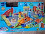 VTech Toet Toet: 8 sets, 63 losse baandelen en 20 auto's, Ophalen, Racebaan, Zo goed als nieuw, Met looping