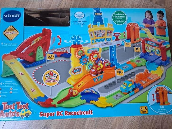 VTech Toet Toet: 8 sets, 63 losse baandelen en 20 auto's, Kinderen en Baby's, Speelgoed | Racebanen, Zo goed als nieuw, Racebaan