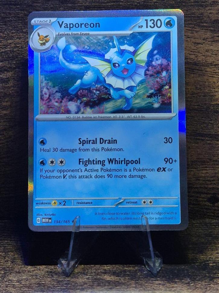 Vaporeon 134/165 - 151 Holo, Hobby en Vrije tijd, Verzamelkaartspellen | Pokémon, Nieuw, Foil, Verzenden