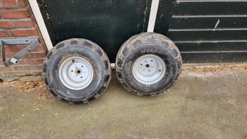 Quad banden met velg beschikbaar voor biedingen