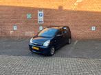 Daihatsu Cuore 1.0 5D 2010 Zwart, Auto's, Daihatsu, Voorwielaandrijving, Stof, 600 kg, Zwart