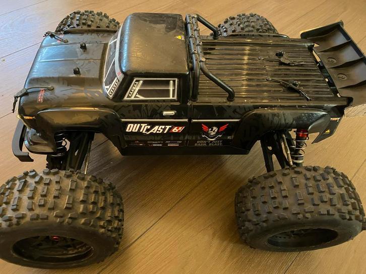 Arrma Outcast 6s EXB met DX5C Zender, Hobby en Vrije tijd, Modelbouw | Radiografisch | Auto's, Zo goed als nieuw, Auto offroad