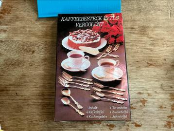 Verguld koffiebestek (nieuw met doos) beschikbaar voor biedingen