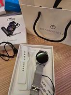 Dames, Lotus smartwatch met reservebandje te koop, Ophalen, Nieuw, Zwart, Android