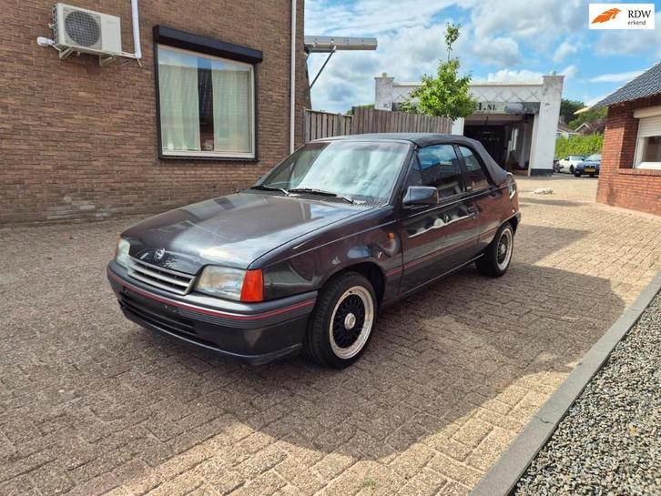 Opel Kadett 1.6S Cabrio lage km stand, Auto's, Opel, Bedrijf, Te koop, Kadett, Lichtmetalen velgen, Metallic lak, Open dak, Benzine