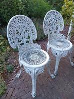 Twee sierlijke witte tuinstoelen, Ophalen