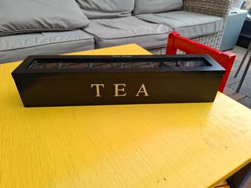 Theedoos met glazen deksel beschikbaar voor biedingen