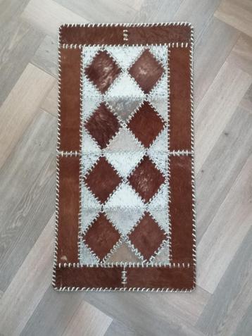 koeienhuid kleed 120 x 61 cm  in goede staat beschikbaar voor biedingen