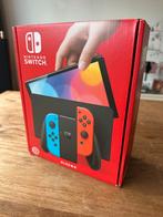 Nintendo Switch OLED Rood/Blauw (Nieuw), Ophalen of Verzenden, Nieuw, Met 2 controllers, Switch OLED