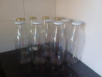 Tien glazen melkflessen sapflessen van 1 liter beschikbaar voor biedingen