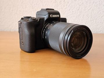 Canon EOS M50 met 18-150 mm lens inclusief oplader en accu's beschikbaar voor biedingen