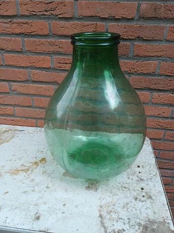 Groene glazen fles zeer leuk als decoratie object  beschikbaar voor biedingen