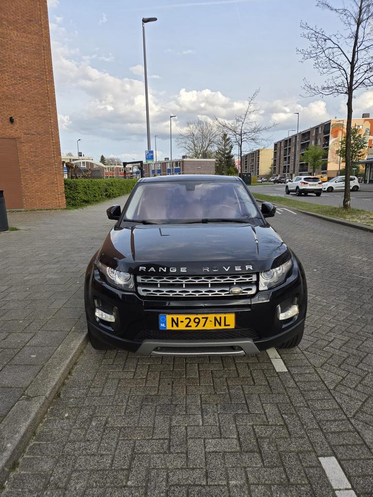 Land Rover 2014 Zwart, Auto's, Automaat, 4 cilinders, Zwart, Leder