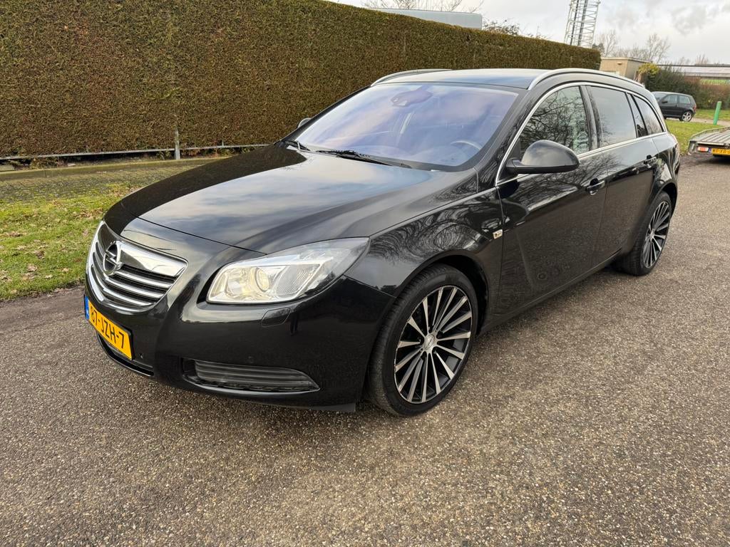 Opel Insignia 1.8 103KW Sports Tourer 2009 Zwart Nieuwe  Apk, Auto's, 4 cilinders, 1796 cc, Zwart, Origineel Nederlands