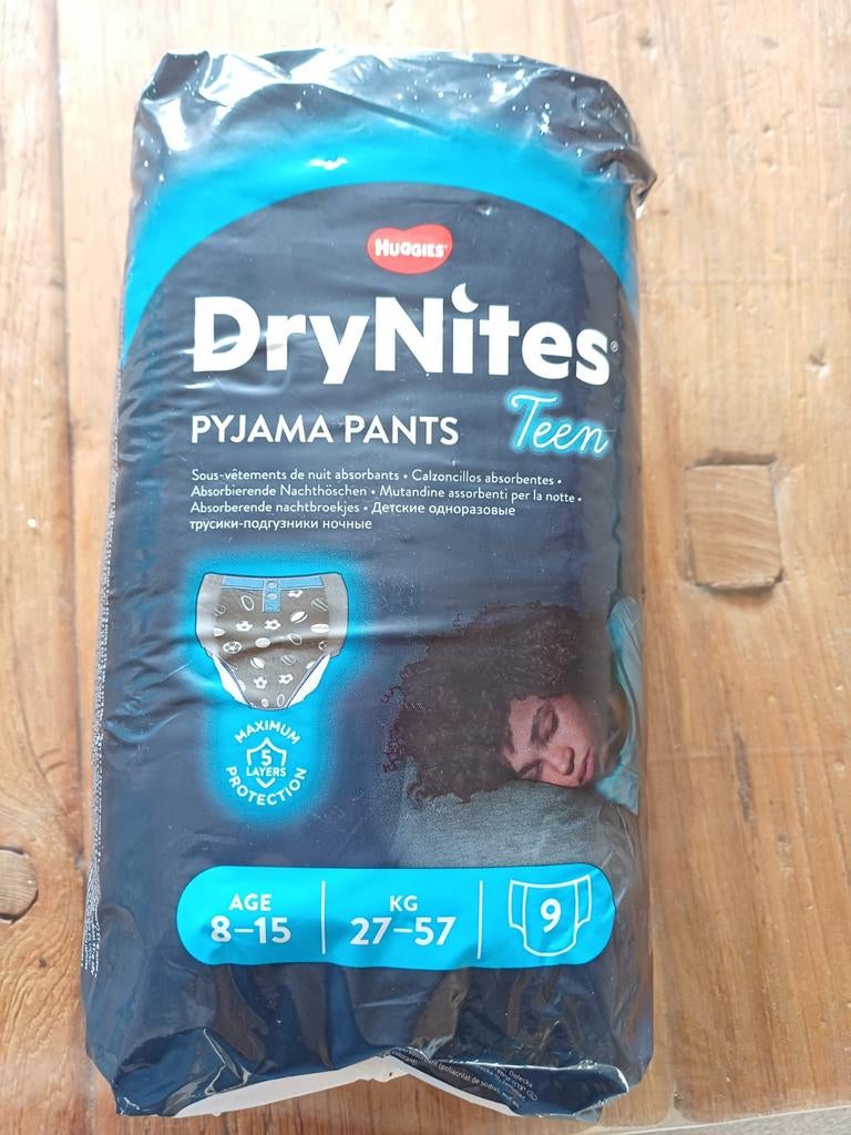 Vier pakken DryNites pyjama broekjes jongens 8-15 jaar, Ophalen
