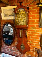 Antieke Friese staartklok, Ophalen