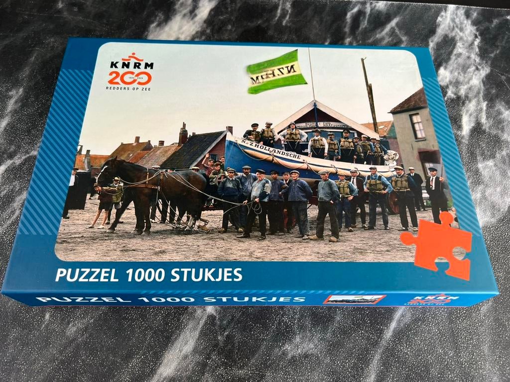 KNRM puzzel 1000 stukjes 200 jaar KNRM, Ophalen of Verzenden, 500 t/m 1500 stukjes, Zo goed als nieuw