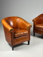 Set van 2 Schapenleren clubfauteuils, Huis en Inrichting, Fauteuils, Ophalen, Zo goed als nieuw, 75 tot 100 cm