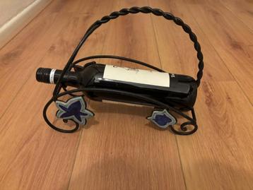 Wijn fles houder gietijzer  beschikbaar voor biedingen