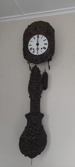 Grote antieke hangklok, Ophalen