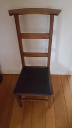 Bidstoeltje met zwarte zitting, Ophalen