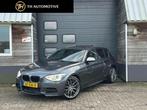 BMW 1-serie M135i xDrive High Executive, Auto's, BMW, Euro 5, Gebruikt, Zwart, 320 pk