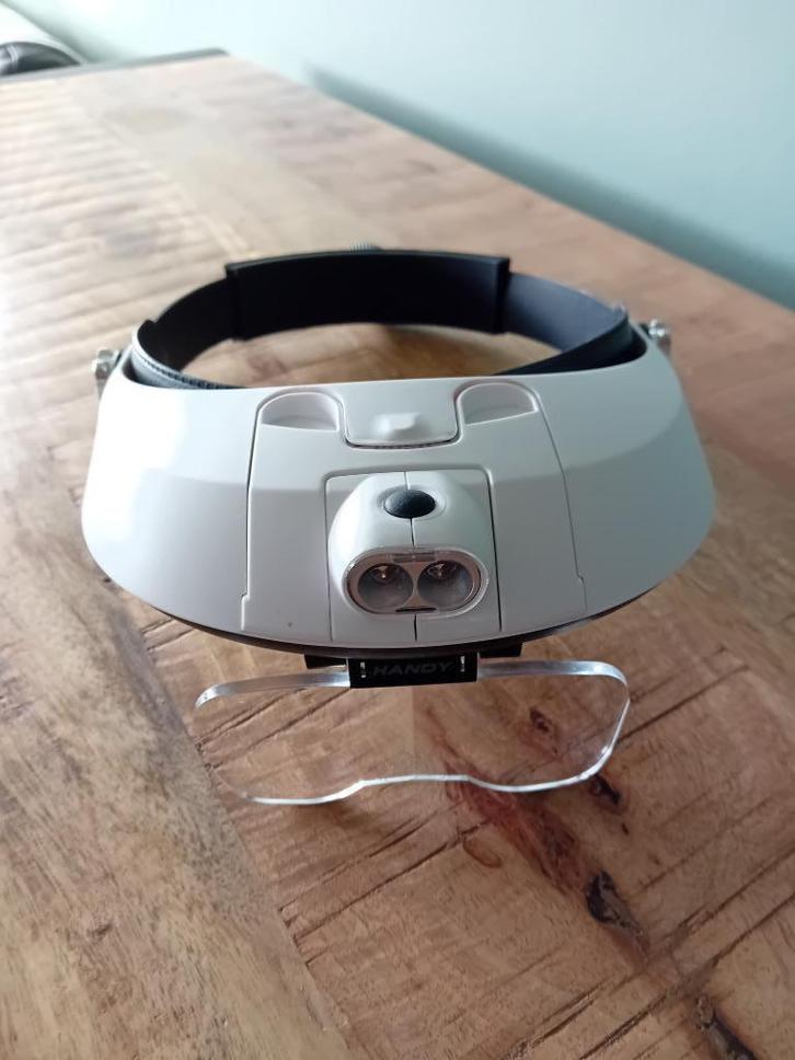Hoofdband met LED verlichting., Hobby en Vrije tijd, Vergrootglazen, Loepen en Loeplampen, Zo goed als nieuw, Loeplamp, Ophalen of Verzenden