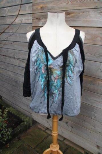 Blouson blauw/ zwart St. Martins mt 40 cold shoulder vaste p beschikbaar voor biedingen