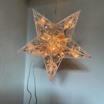 Kerstster met verlichting beschikbaar voor biedingen