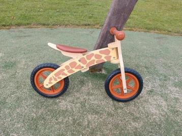 Loopfiets giraf hout  beschikbaar voor biedingen