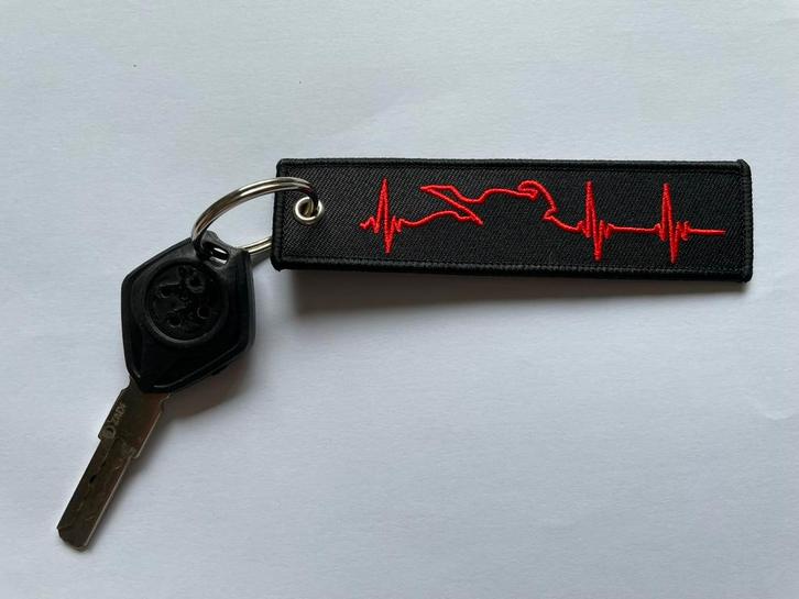 Silhouet hartslag/motor, Verzamelen, Sleutelhangers, Nieuw, Merk, Ophalen