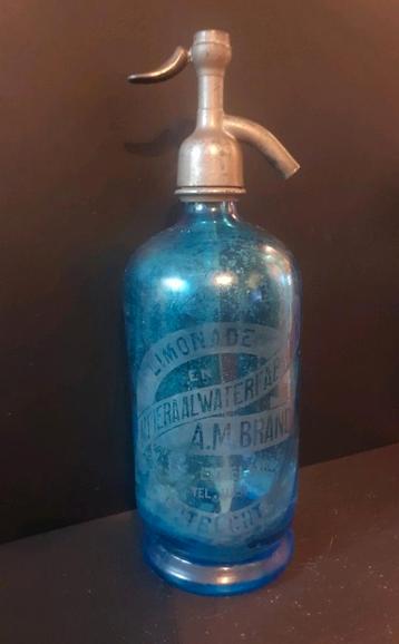 A.M. Brand Utrecht - blauwe spuitwater- mineraalwaterfles  beschikbaar voor biedingen