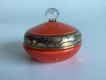 oranje glazen art deco poederdoos beschikbaar voor biedingen