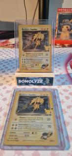 Rocket's Zapdos - Celebrations Classic Collection, Hobby en Vrije tijd, Verzamelkaartspellen | Pokémon, Ophalen of Verzenden, Zo goed als nieuw