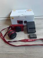Nikon 1 J1 Body - Rood, Gebruikt, Compact, Ophalen of Verzenden, Nikon