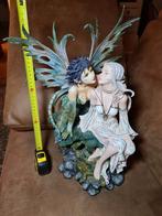 Minimaal Beschadigd beeld van twee feeën, Ophalen